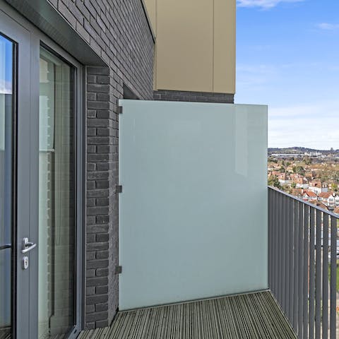 Sit out on the balcony overlooking Wembley Arch
