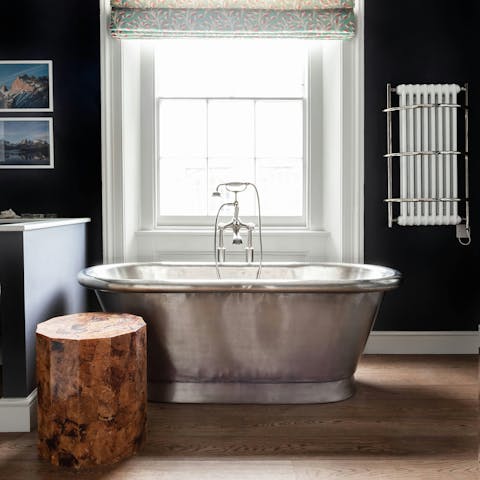 Slip into the freestanding bath after a long day