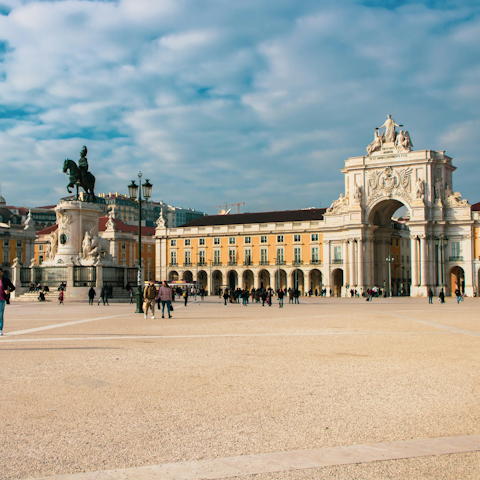 Start your morning with a wander around Praça do Comércio, less than fifteen minutes away