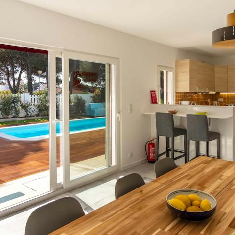 Spend lunch around the oak dining table, cooled by the outside breeze
