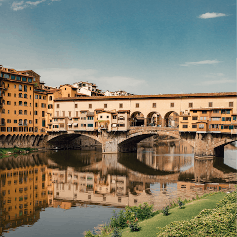Visit the iconic Ponte Vecchio, just over 500 metres away