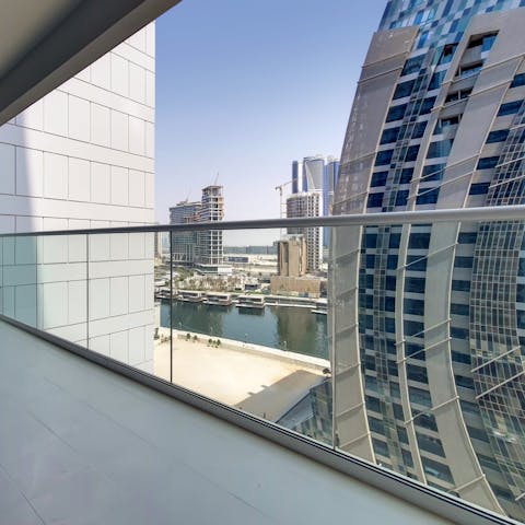 Take in the views of the Dubai Canal from the private balcony
