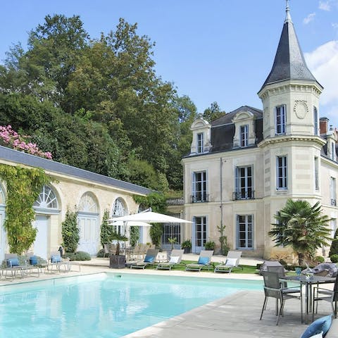 Feel like royalty as you sunbathe with the chateau towering over you