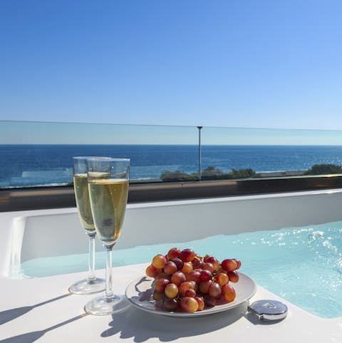 Treat yourself to a drink in the Jacuzzi