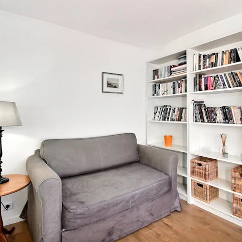 Choose a book from the shelf and relax with a glass of French wine