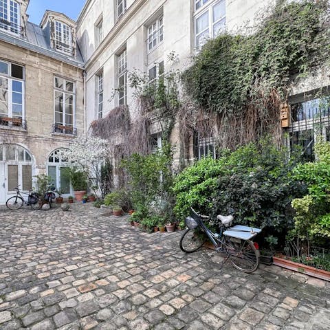 Take in the views over the typically Parisian courtyard