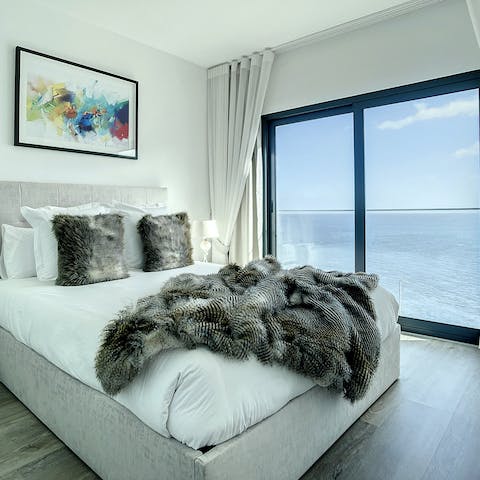 Wake up feeling well-rested in the cosy bedroom and let the ocean greet you