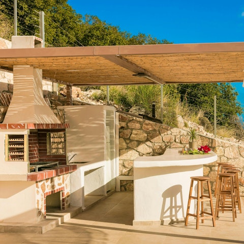 Take a seat at the bar and enjoy golden hour drinks
