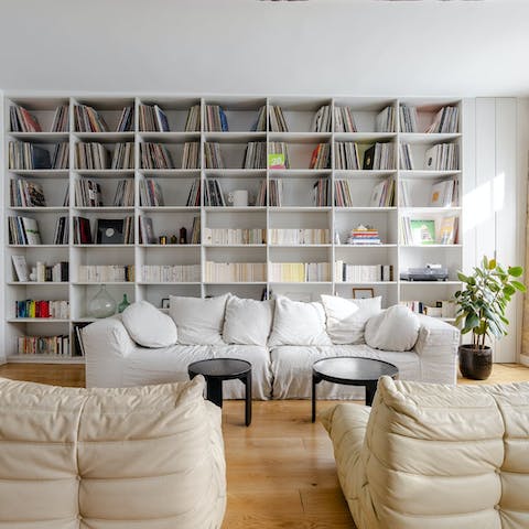 Curl up on the sofa with a good book from the available selection