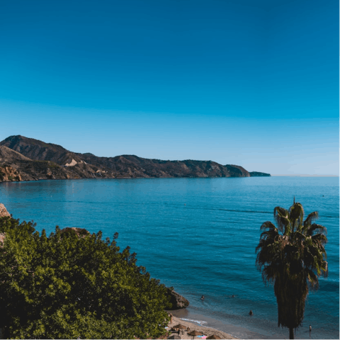 Start your day with a stroll along Burriana Beach, short drive from your villa