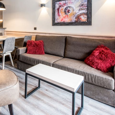Cuddle up for a movie night on the comfy sofas