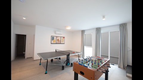 Challenge friends and family to table tennis in the games room