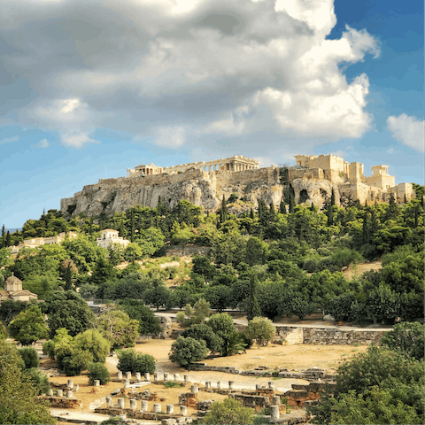 Reach the foot of the iconic Acropolis in just fifteen minutes