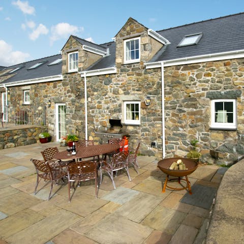 Light the fire pit and enjoy evenings outdoors long after the sun has set