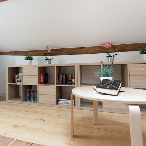 Pick a book from the mini library and enjoy with a glass of French wine