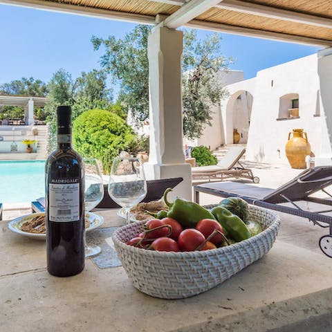 Tuck into light lunches in the shade of the shared poolside pergola