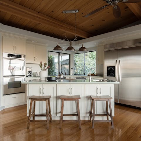 Impress with your cooking skills in the sleek kitchen