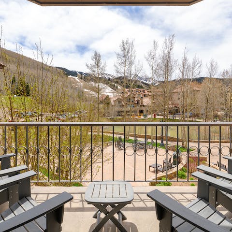 Relax and unwind on your own private balcony, which offers tranquil views of the pond and the mountains beyond
