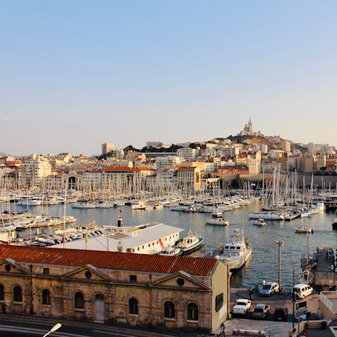 Grab an ice cream and enjoy a stroll around the Old Port, a few steps from your apartment