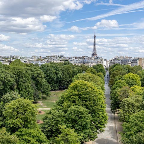 Enjoy a postcard view of the Eiffel Tower from the balcony