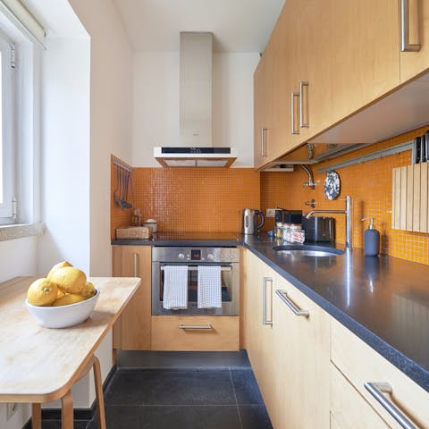 Cook up a homemade feast in the sunny tangerine kitchen