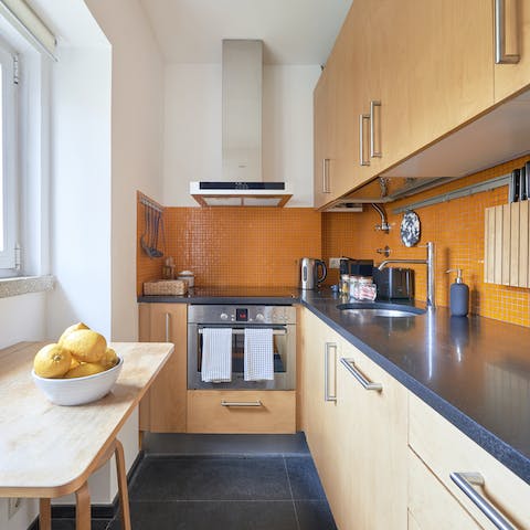 Cook up a homemade feast in the sunny tangerine kitchen