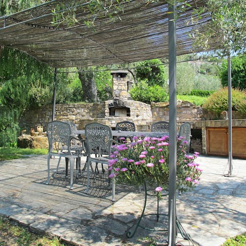 Enjoy outdoor dining in the beautiful shady gardens