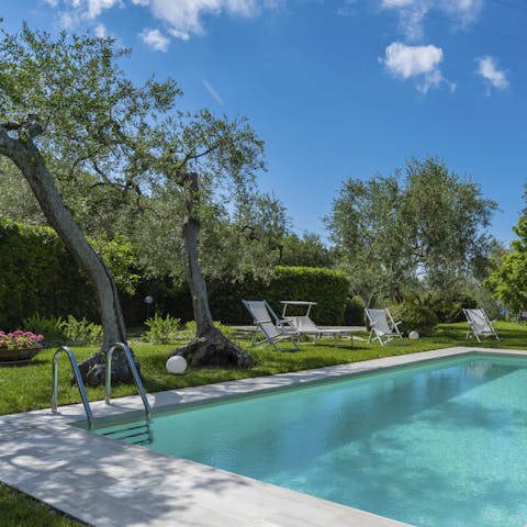 Swim a few lengths then stretch out on a sun lounger and relax