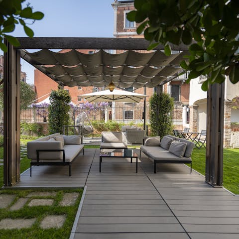 Relax in the building's charming garden