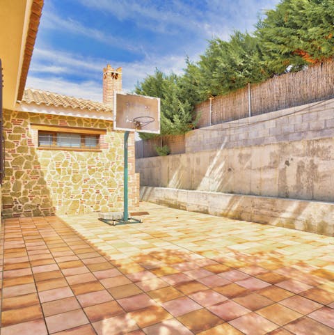 Shoot a few hoops with family or friends on your villa's private basketball court