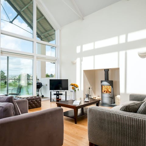 Curl up beside the fire on winter days to enjoy the lake views