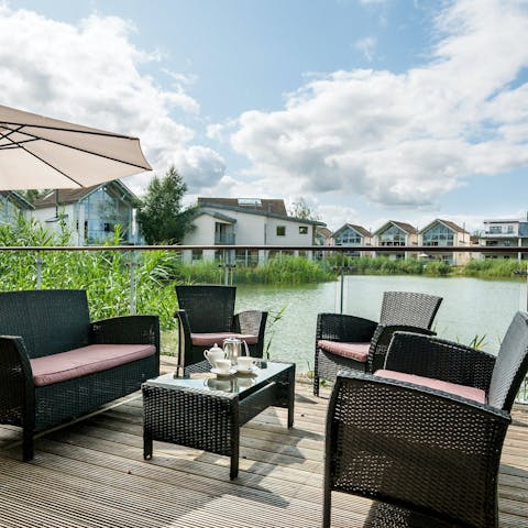 Drink in the lakeside vistas with morning coffees on the private deck