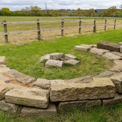 Share stories around the outdoor fire pit