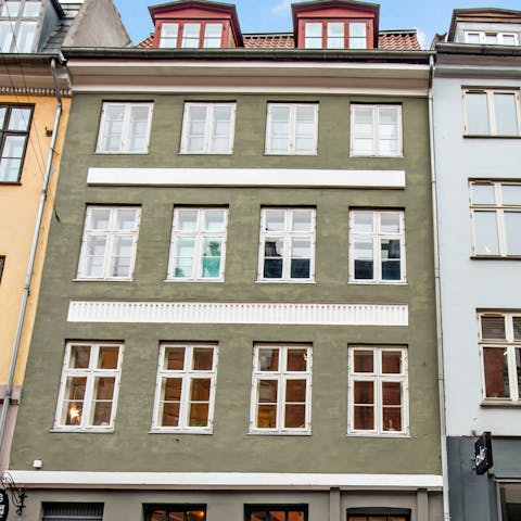 Admire the apartment's historic facade