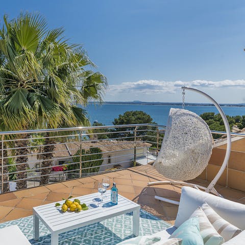 Enjoy elevated views across the bay from the terrace
