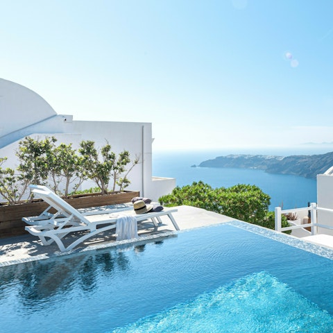 Stretch out on a sun lounger and take in the sea views