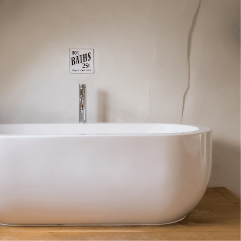 Soak in the glorious bathtub