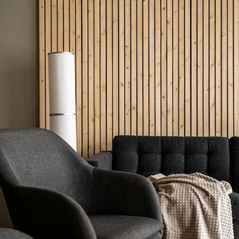 Curl up on the comfy sofa with a glass of wine and a good book
