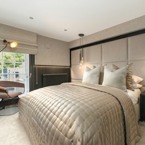 Wake up feeling restored in the elegant bedroom