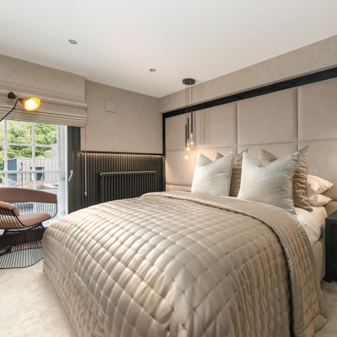 Wake up feeling restored in the elegant bedroom