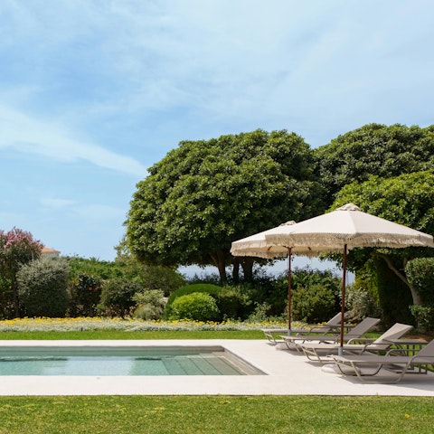 Relax in the Greek sun next to the private pool