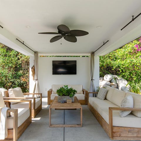 Chill out in the full outdoor living room in the shade