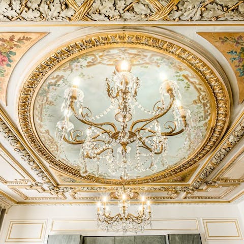 Admire the home's  incredible, hand-painted original features