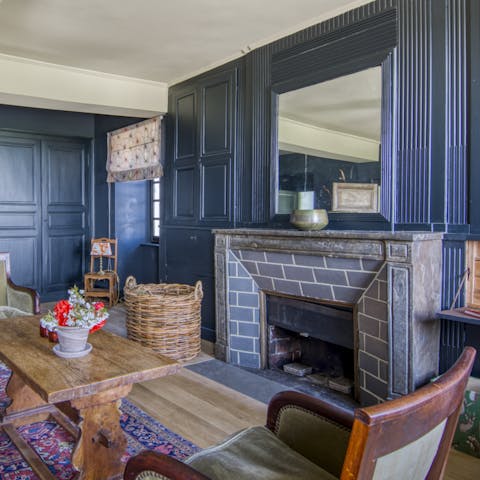 Cosy up by the fireplace