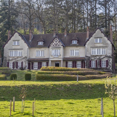 Admire the historic hunting lodge facade