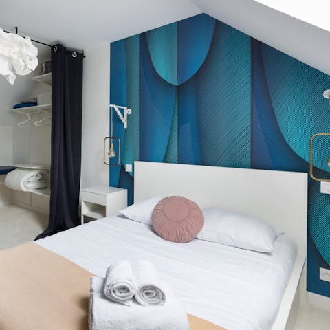 Climb up the stairs to a land of sweet dreams, courtesy of the comfy bedroom