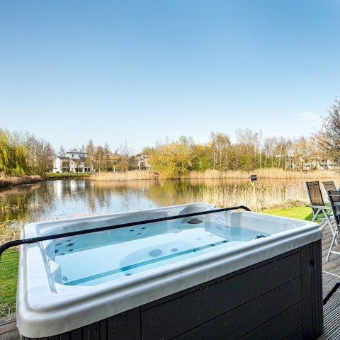 Sink into the private hot tub out on the deck and feel yourself unwind