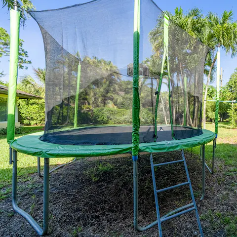 Keep the kids entertained with the playground and trampoline