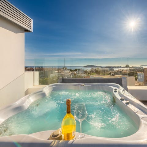 Soak in the Jacuzzi as the sun goes down