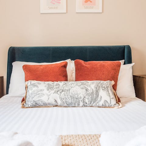 Doze off in the sumptuous bed after a busy day spent exploring